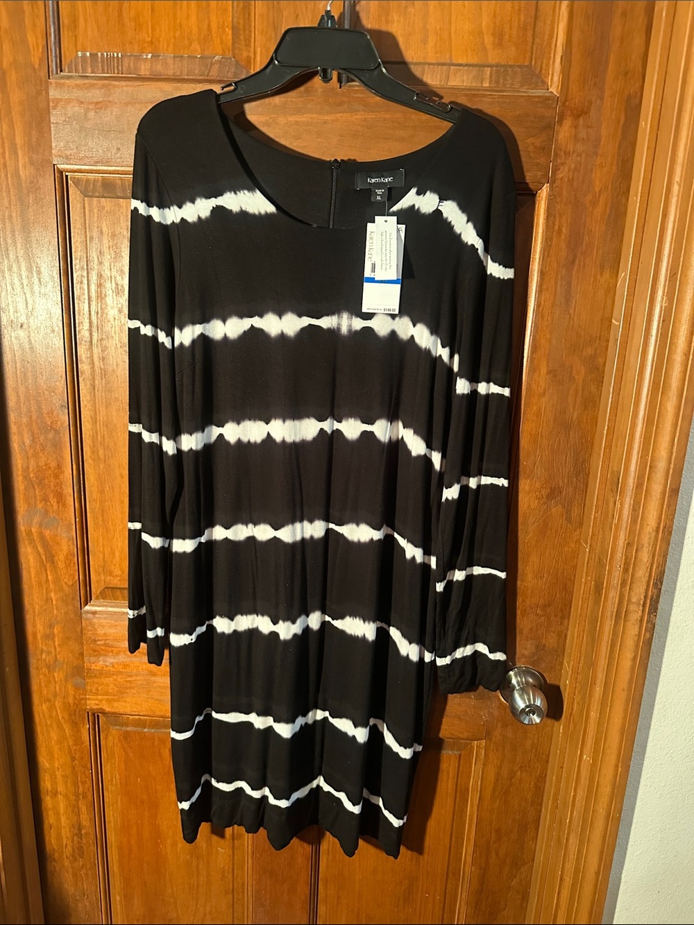Karen Kane Black Top with White Logo Stitching